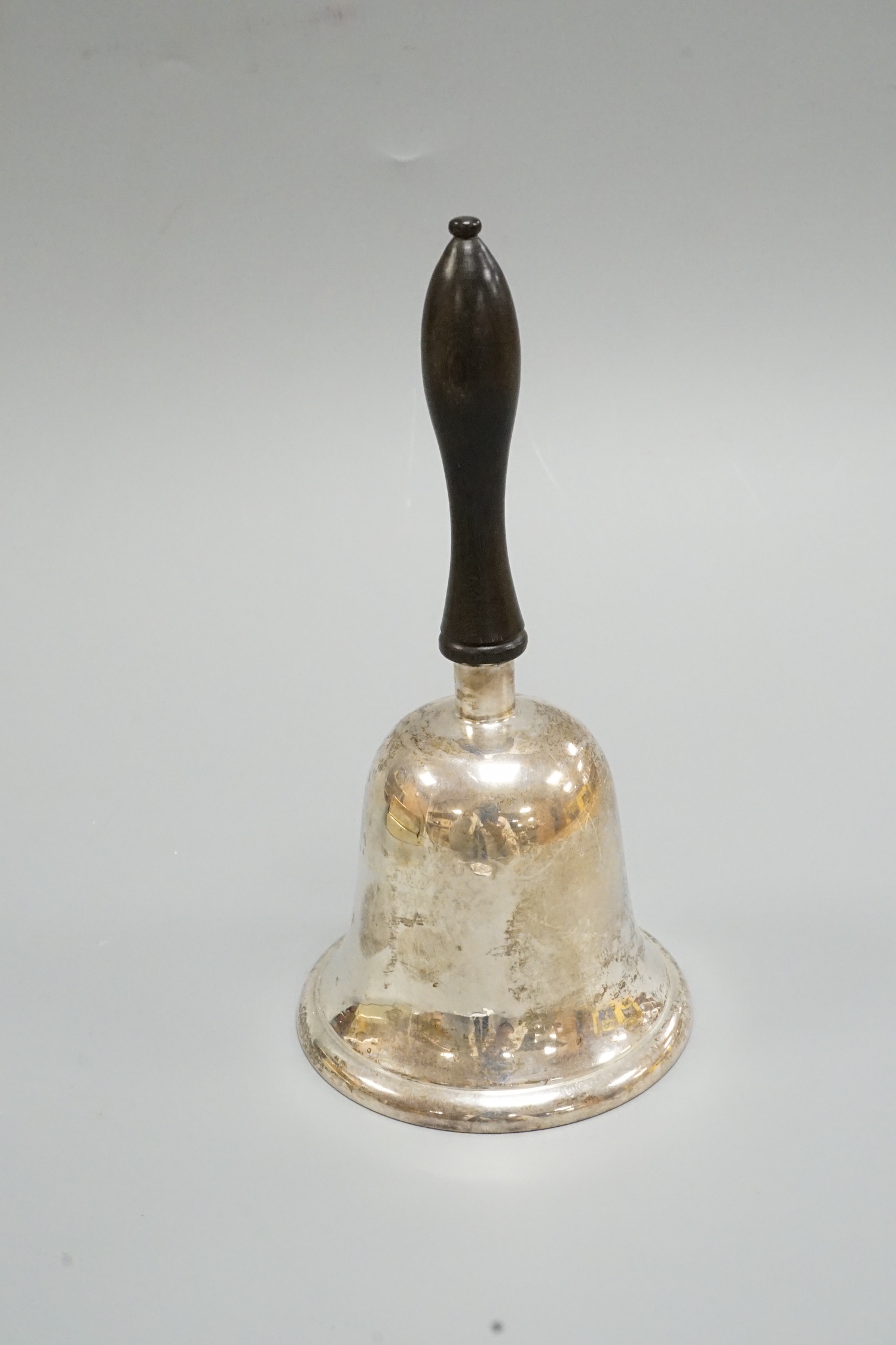 A George V silver hand bell, Chester, 1919, height 14.3cm.